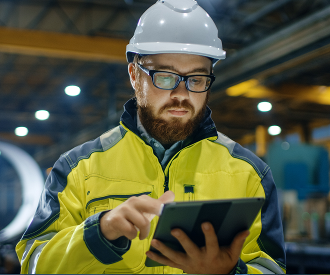 engineer looking at tablet